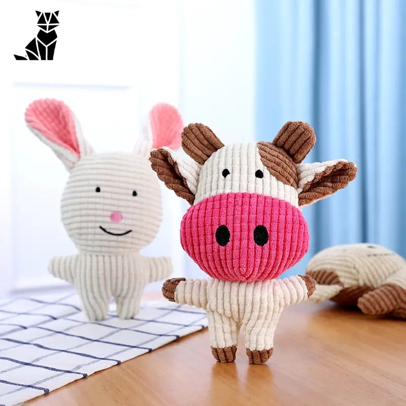 Vache en peluche sur une table en bois de Fun Donkey Toy with Squeaker forme dâne jouet